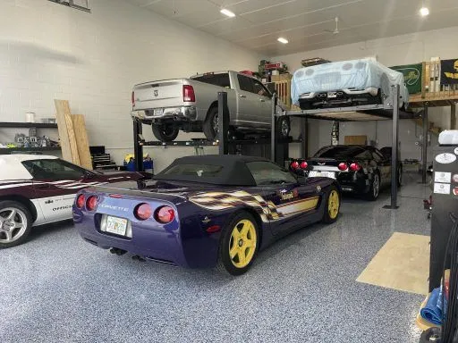 Garage condo with car lift, Corvette and classic collection